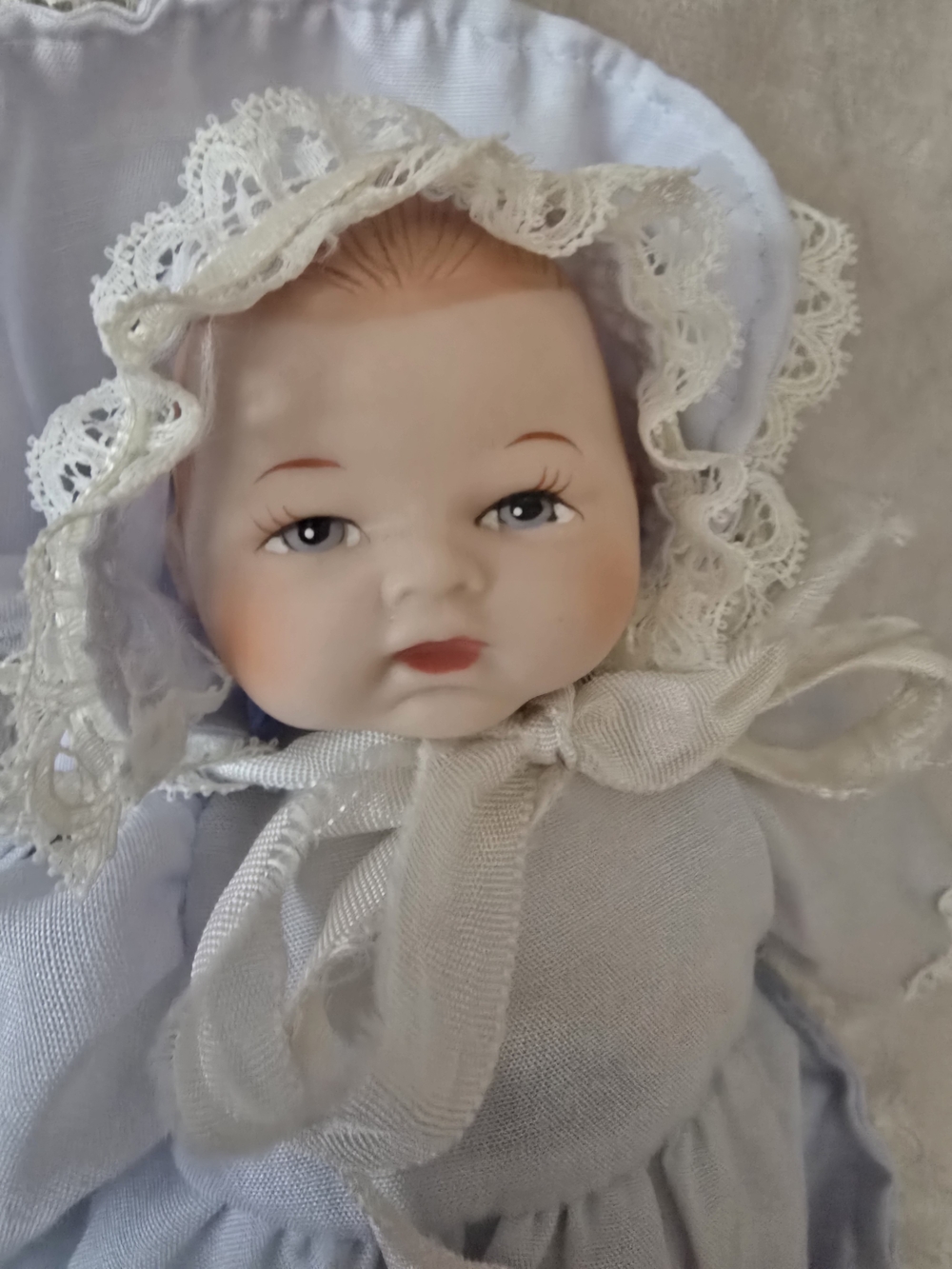 Vintage Porcelain Baby Doll in Light Blue Dress and Bonnet 8' Lenght